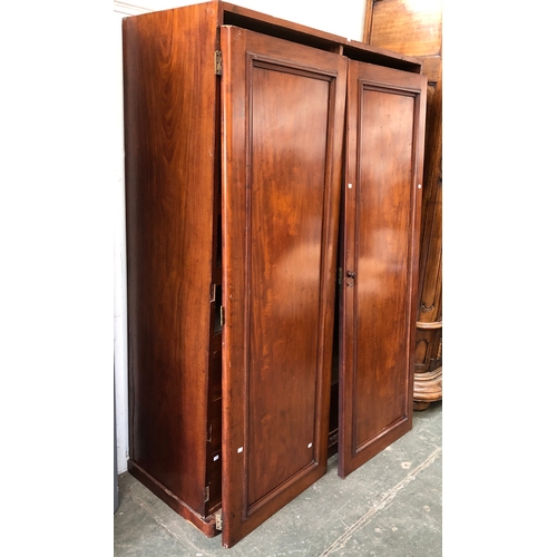 970 - A 19th century mahogany gents compactum wardrobe, slide drawers and hanging rail, 145x64x203cmH