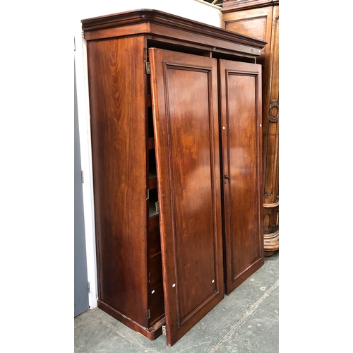 970 - A 19th century mahogany gents compactum wardrobe, slide drawers and hanging rail, 145x64x203cmH