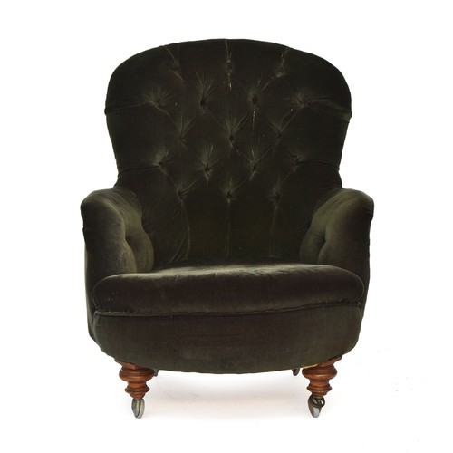 916 - A Victorian buttonback armchair by Cornelius V Smith, on turned front legs, one back leg stamped CVS... 