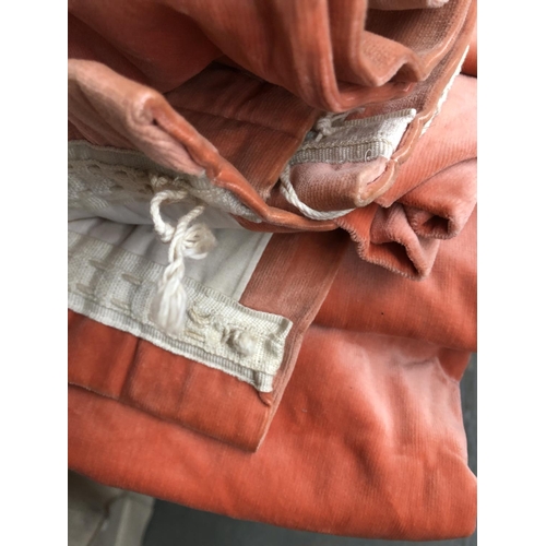 778 - Five coral velvet curtains, lined; each approx 225cm drop, 110cm ungathered width; some fading, with... 