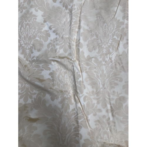 979 - A pair of cream curtains with acanthus and floral design, lined, 145cm drop, 240cm ungathered width