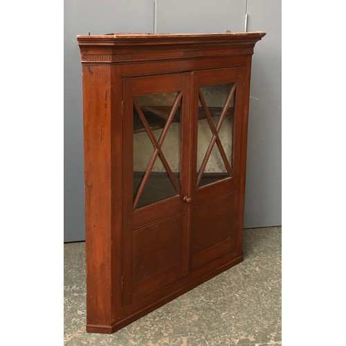 724 - A glazed mahogany corner cupboard, 92cmW