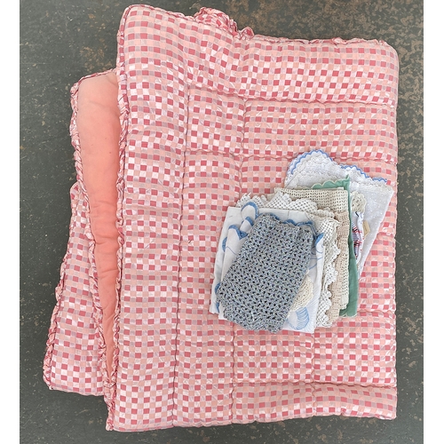 847 - A vintage pink checkered eider down quilt, together with a small quantity of linen