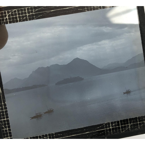 251 - Five magic lantern slides of Italian lakes comprising early morning and sunset on Lake Como, fishing... 