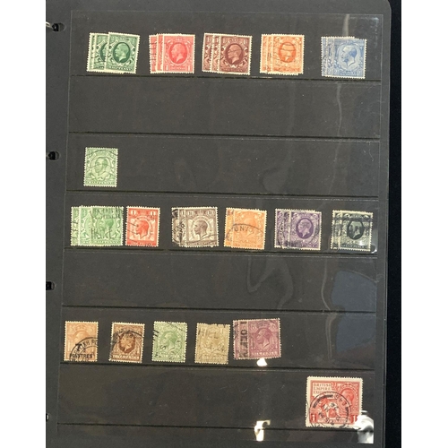 407 - A large quantity of British definitive and commemorative stamps in three black albums, Victorian to ... 