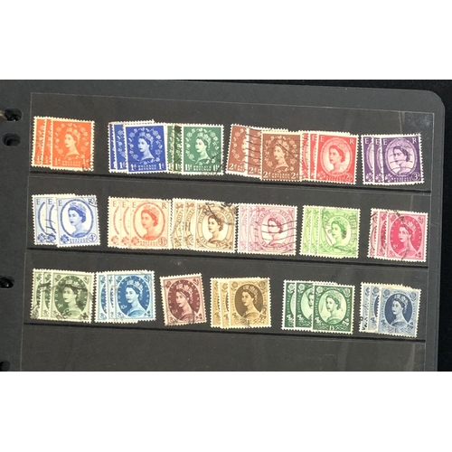 407 - A large quantity of British definitive and commemorative stamps in three black albums, Victorian to ... 