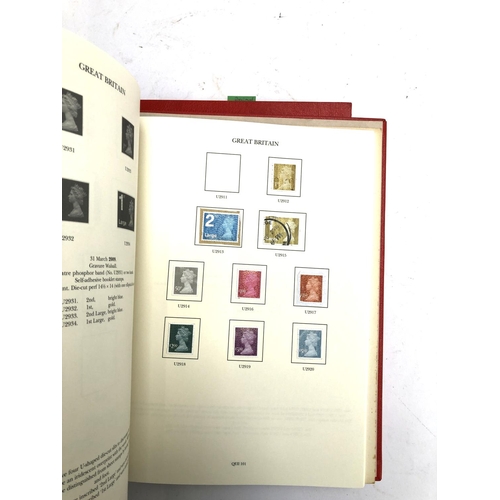 409 - A quantity of British definitive stamps in three red Windsor albums, 1971 onwards, to include region... 