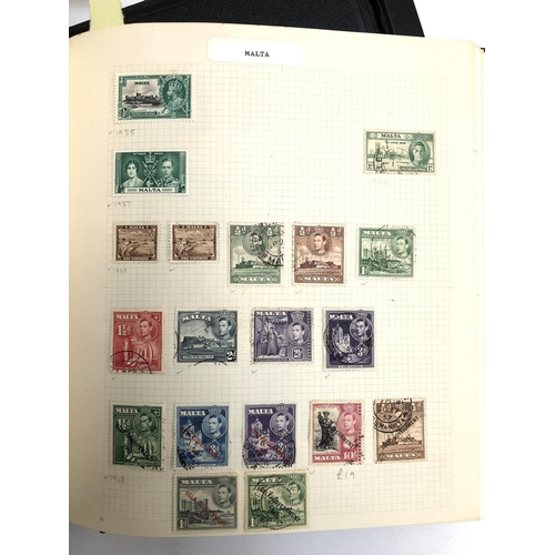 413 - A large quantity of definitive and commemorative stamps in four Devon albums, Victorian to 21st cent... 