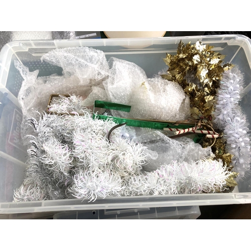 461 - Three large boxes of Christmas decorations, tinsel, figurines, bells, tree ornaments, gift bags, fai... 