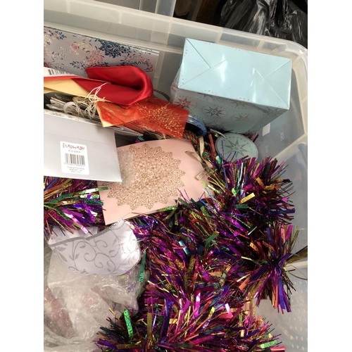 461 - Three large boxes of Christmas decorations, tinsel, figurines, bells, tree ornaments, gift bags, fai... 