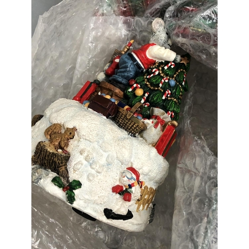 461 - Three large boxes of Christmas decorations, tinsel, figurines, bells, tree ornaments, gift bags, fai... 