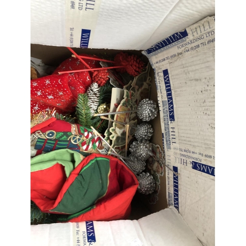 461 - Three large boxes of Christmas decorations, tinsel, figurines, bells, tree ornaments, gift bags, fai... 