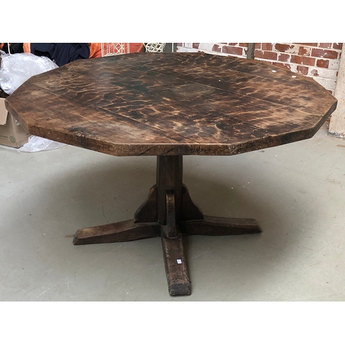 985 - A modern twelve sided oak table on pedestal base, approx. 133cmD, 75cmH