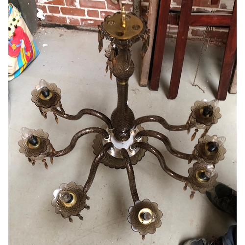 987 - An eight arm smoked glass chandelier, approx. 82cmD