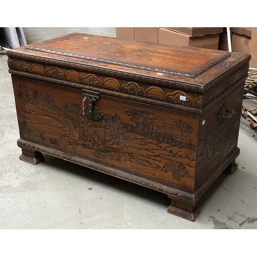 991 - A Chinese carved camphor wood chest, 101x52x58cmH