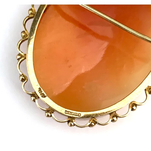 19 - A 9ct gold mounted shell cameo brooch, hallmarked WJP, Birmingham 11.8g gross weight