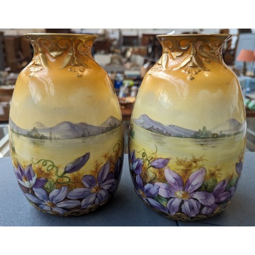 143 - A pair of Royal Bonn vases, pattern D5793, 21cmH