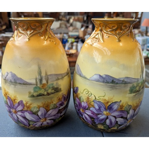 143 - A pair of Royal Bonn vases, pattern D5793, 21cmH