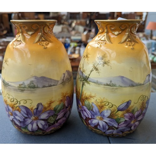 143 - A pair of Royal Bonn vases, pattern D5793, 21cmH