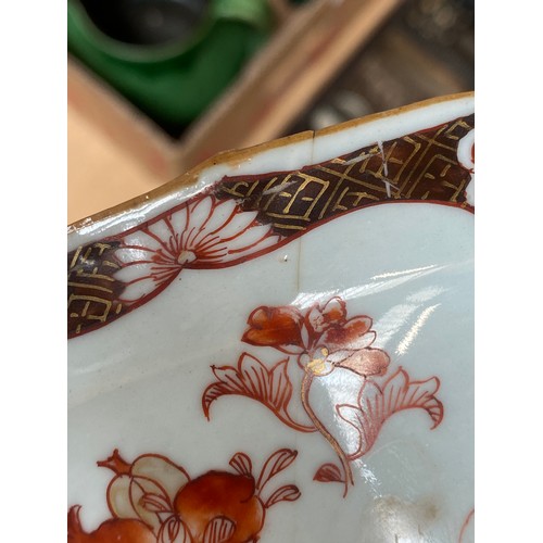 332 - A Chinese blue and white dish with shaped edge, depicting scholars reading a scroll, character marks... 