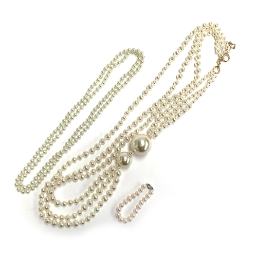 12 - A large oversized faux pearl necklace, the largest pearl 3.9cmD; a cultured pearl bracelet with 925 ... 