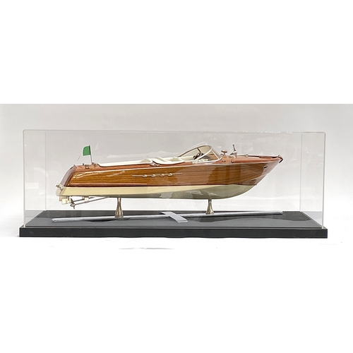 244 - Model boat interest: A scale model of a Venetian motor launch, probably Riva, 64cm long, within a pe... 