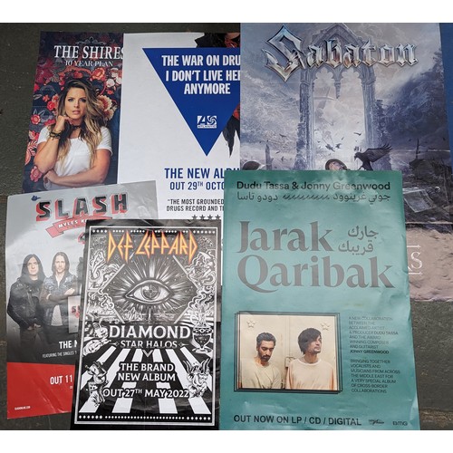 504 - A quantity of album promotion posters to include: Johnny Marr, Blur, Gene Vincent, Slash, Jarak Qari... 