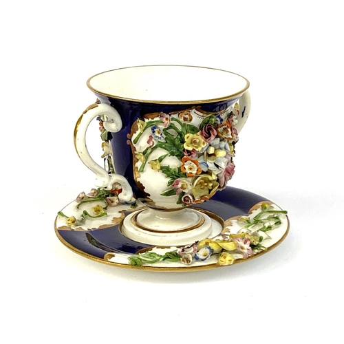 137 - A 19th century Derby porcelain twin handled cup and saucer with floral encrusted decoration, 8cmH