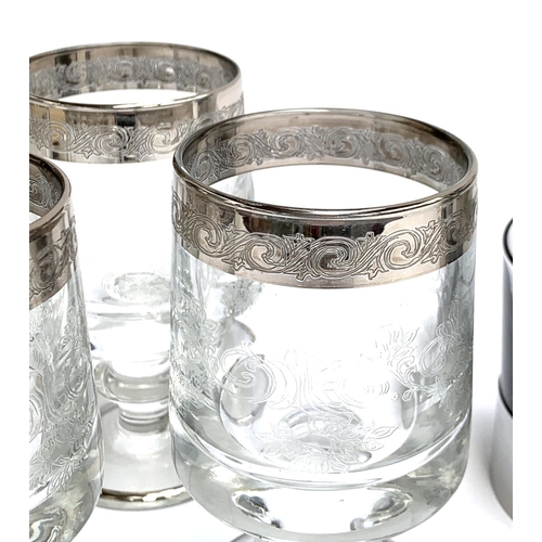 156 - A set of six mid century grey glass tumblers; together with six etched glass hock glasses with silve... 