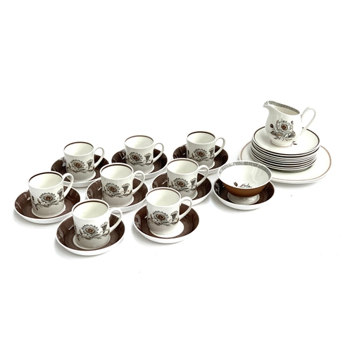 157 - A Susie Cooper brown passion flower pattern part coffee service comprising cups (8), saucers (9), si... 