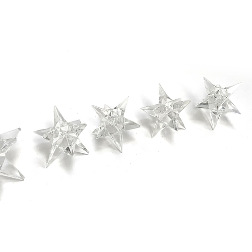 164 - A set of eight mid century Rosenthal crystal star candle holders (af), the largest 11.5cmH