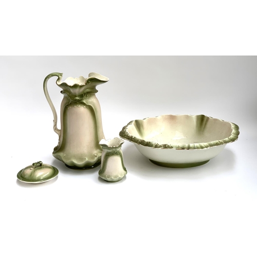 174 - A ceramic washbowl, jug 34cmH, soap dish and vase