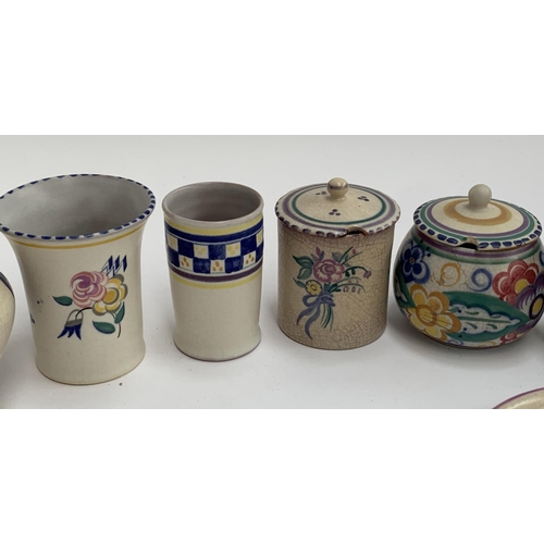 179 - A collection of Poole Carter Stabler Adams pottery, c.1921-34, comprising vases, jam pots, a jug 12c... 