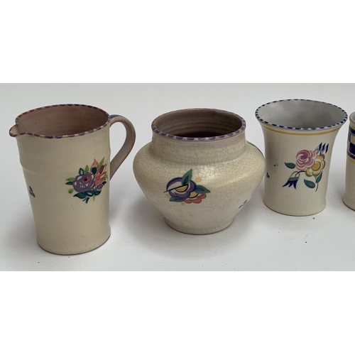 179 - A collection of Poole Carter Stabler Adams pottery, c.1921-34, comprising vases, jam pots, a jug 12c... 