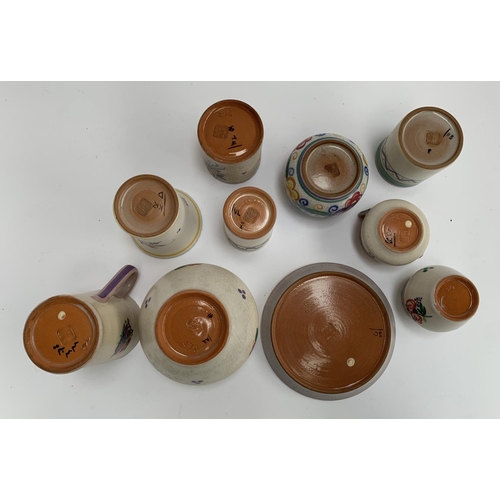 179 - A collection of Poole Carter Stabler Adams pottery, c.1921-34, comprising vases, jam pots, a jug 12c... 