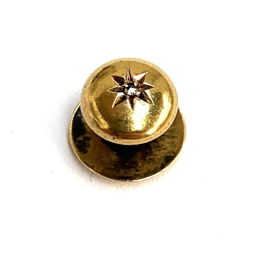 14 - A single Victorian 15ct gold stud set with a diamond chip in a star burst setting, hallmarked for Ch... 