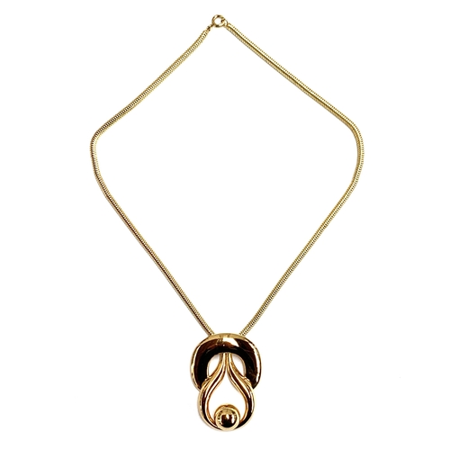 21 - A vintage Grosse (for Dior) gilt metal pendant on snake chain, marked to reverse 'Grosse 1971 German... 