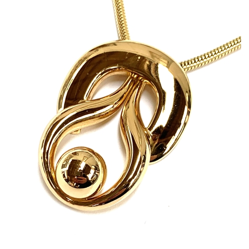 21 - A vintage Grosse (for Dior) gilt metal pendant on snake chain, marked to reverse 'Grosse 1971 German... 