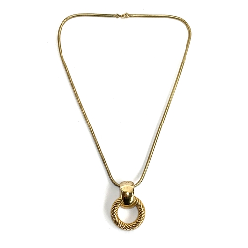 22 - A vintage Grosse (for Dior) gilt metal pendant on snake chain, marked to reverse 'Grosse 1971 German... 