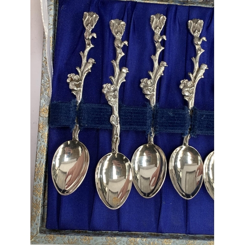 119 - A cased set of Australian Rodd silver plated teaspoons designed as a Koala, lizard and Kookaburra on... 