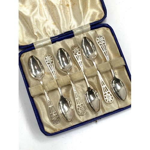 105 - A cased set of teaspoons with pierced floral design, hallmarked for Thomas Bradbury & Sons Ltd, Shef... 