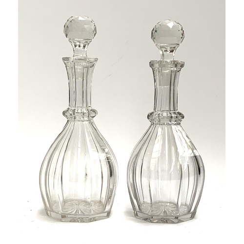 202 - A near pair of cut glass decanters, each approx. 32cmH