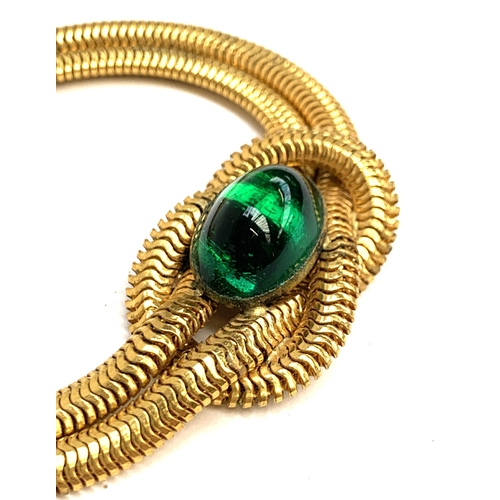 39 - Four gold tone costume necklaces to include a Gripoix style double snake chain necklace with green g... 