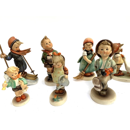 216 - A quantity Goebel Hummel figurines to include 'Be Patient', 'To Market', 'Happy Traveller', 'Little ... 