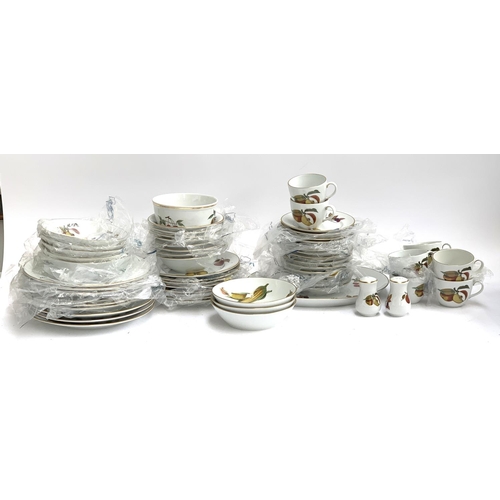 221 - A Royal Worcester 'Evesham' part dinner service to include teacups, bowls, side plates, dinner plate... 