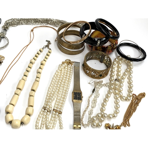 43 - A lot of various necklaces, faux pearls, bangles, Cloisonne enamel pendant etc