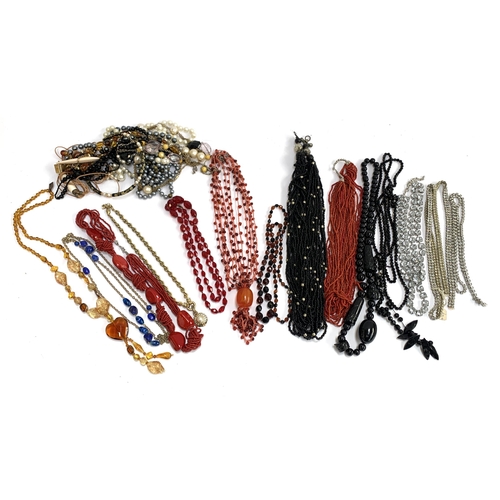 44 - A quantity of necklaces, mainly black and red tone to include coral, faux pearls, French jet etc