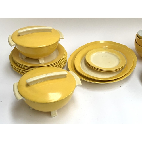 185 - A Bristol Pountney & Co 'Amberone' mid century part dinner service, comprising tureens, meat plate, ... 