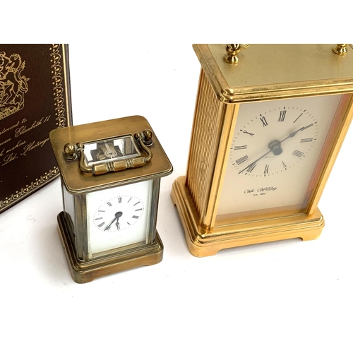 93 - A miniature Thwaites & Reed carriage clock, 8cmH, together with a further quartz Widdop carriage clo... 