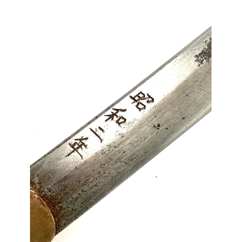 313 - A Japanese samurai style sword, the blade with engraved character marks, the tsuba with figures, the... 